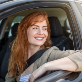 Lengericher Versicherungen - Frau im Auto